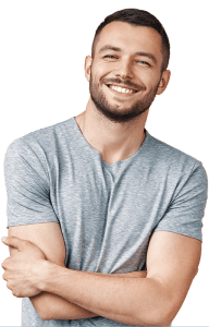 Man with beard in grey shirt smiling