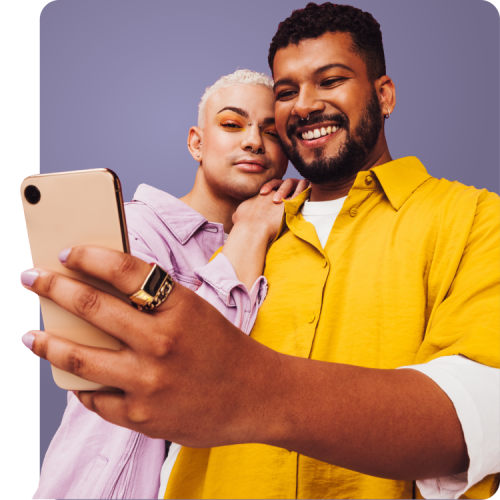 Q Care Plus – Doxy PEP – Who Should Use Doxy Pep Image Two men looking up STI prevention and treatment options on a smartphone